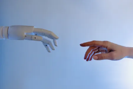 AI robot hand with human hand