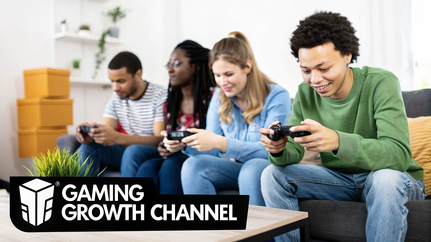 Four young friends happily playing video games together on a couch in a living room.
