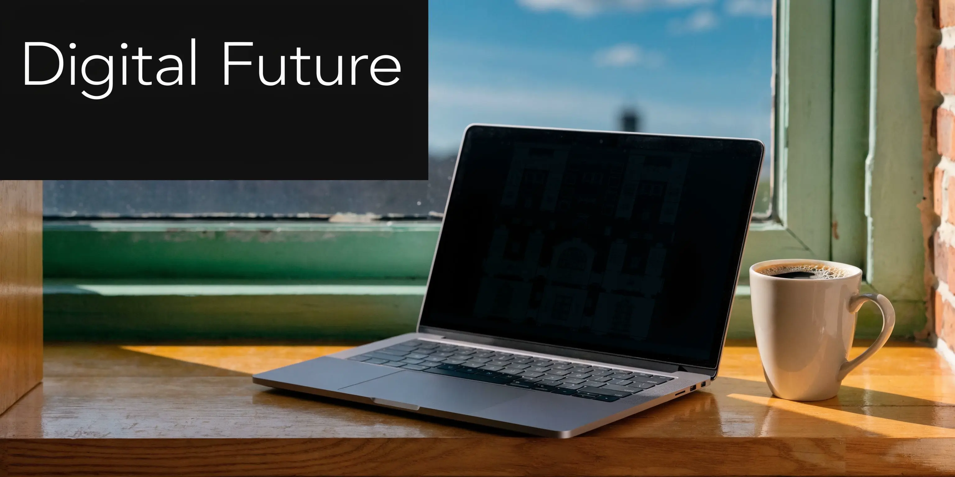 A modern laptop displaying architectural blueprints on a sunlit wooden windowsill next to a coffee mug.