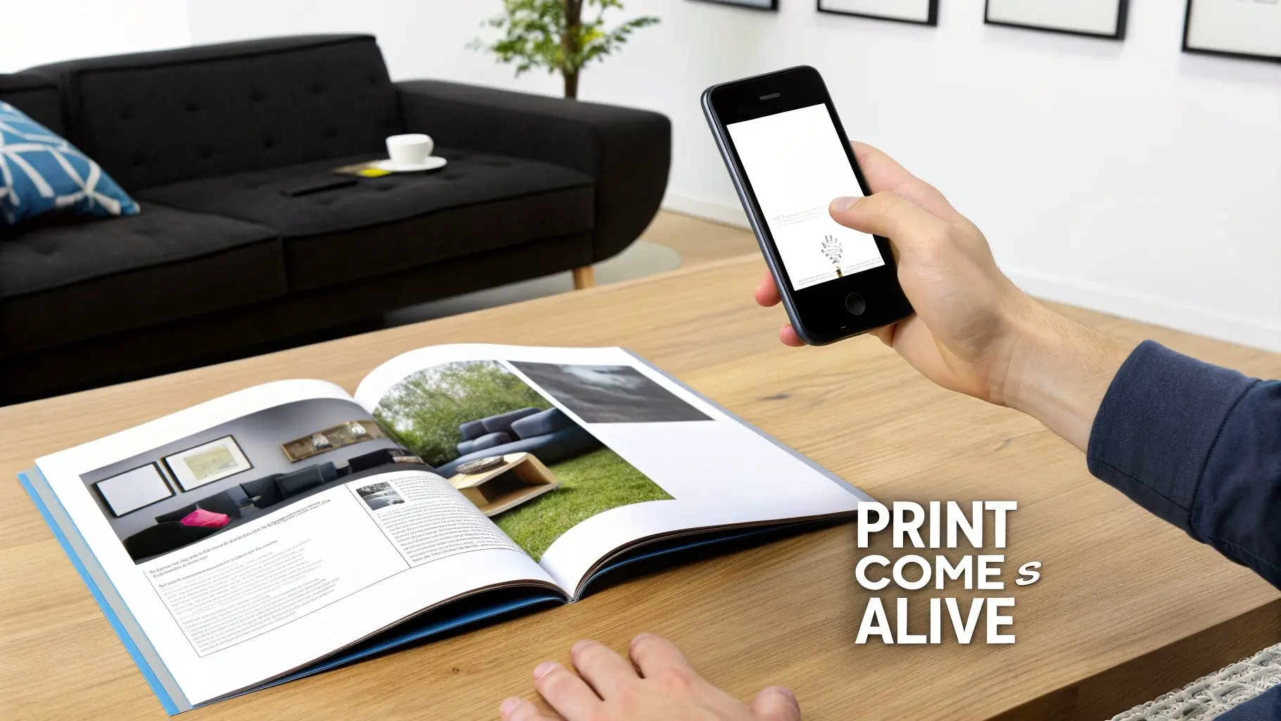 A hand holds a smartphone over an open magazine on a wooden table, demonstrating augmented reality interaction.